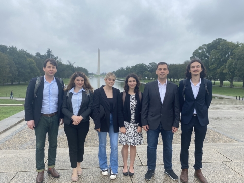 ICFJ and Metamorphosis Foundation staff with the two highest-performing participants from the 2023 program at the National Mall in September 2023 