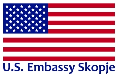United States flag with words U.S. Embassy Skopje underneath