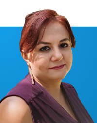 Portrait of Mehrnaz Samimi on blue background