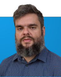 Portrait of Alexandre Orrico on blue background