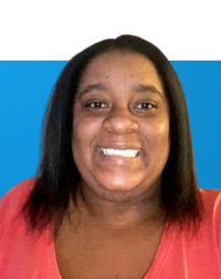 Portrait of Danielle Mitchell with a blue background