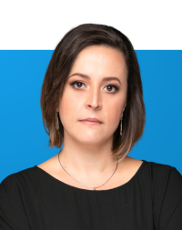 Portrait of Cristina Tardaguila on blue background
